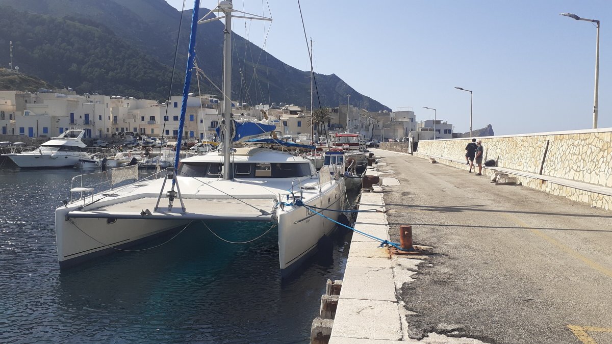 Night catamaran cruises through the Corinth canal from Poros