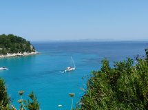 Sailing boat through Greek landscapes