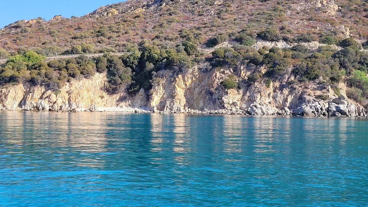 Explore the crystal-clear waters of the Gulf of Cagliari on a sailboat