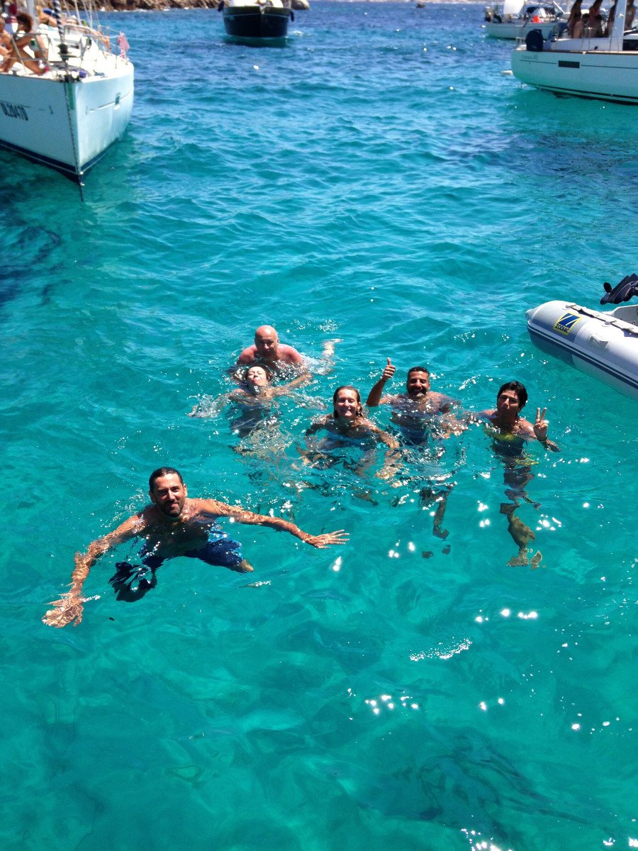 Explore the pristine beaches and bays of Sardinia and Corsica