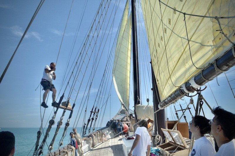 A classic schooner sailing along the coast of Mahón