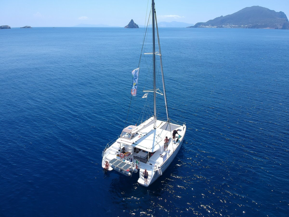Enjoy the view from a catamaran in the Aeolian Islands