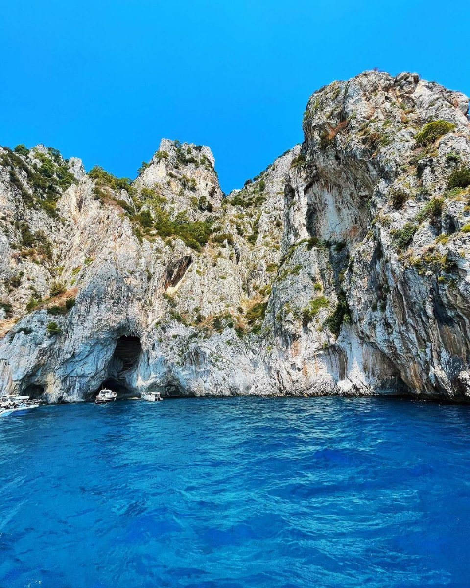 Watch the sunset while sailing in Capri's crystal-clear waters