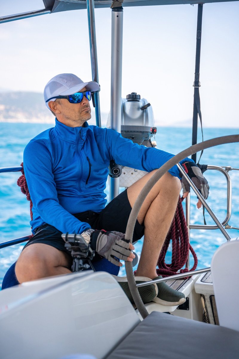 young-man-captain-stands-at-the-helm-and-controls-2025-03-10-16-29-20-utc