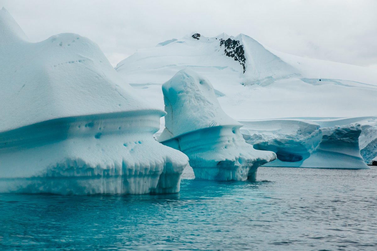 Sailing expedition boat in Antarctica, navigation and adventure journey