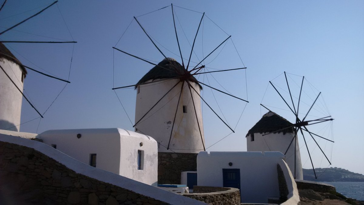 Explore the blue waters of the Cyclades on a catamaran