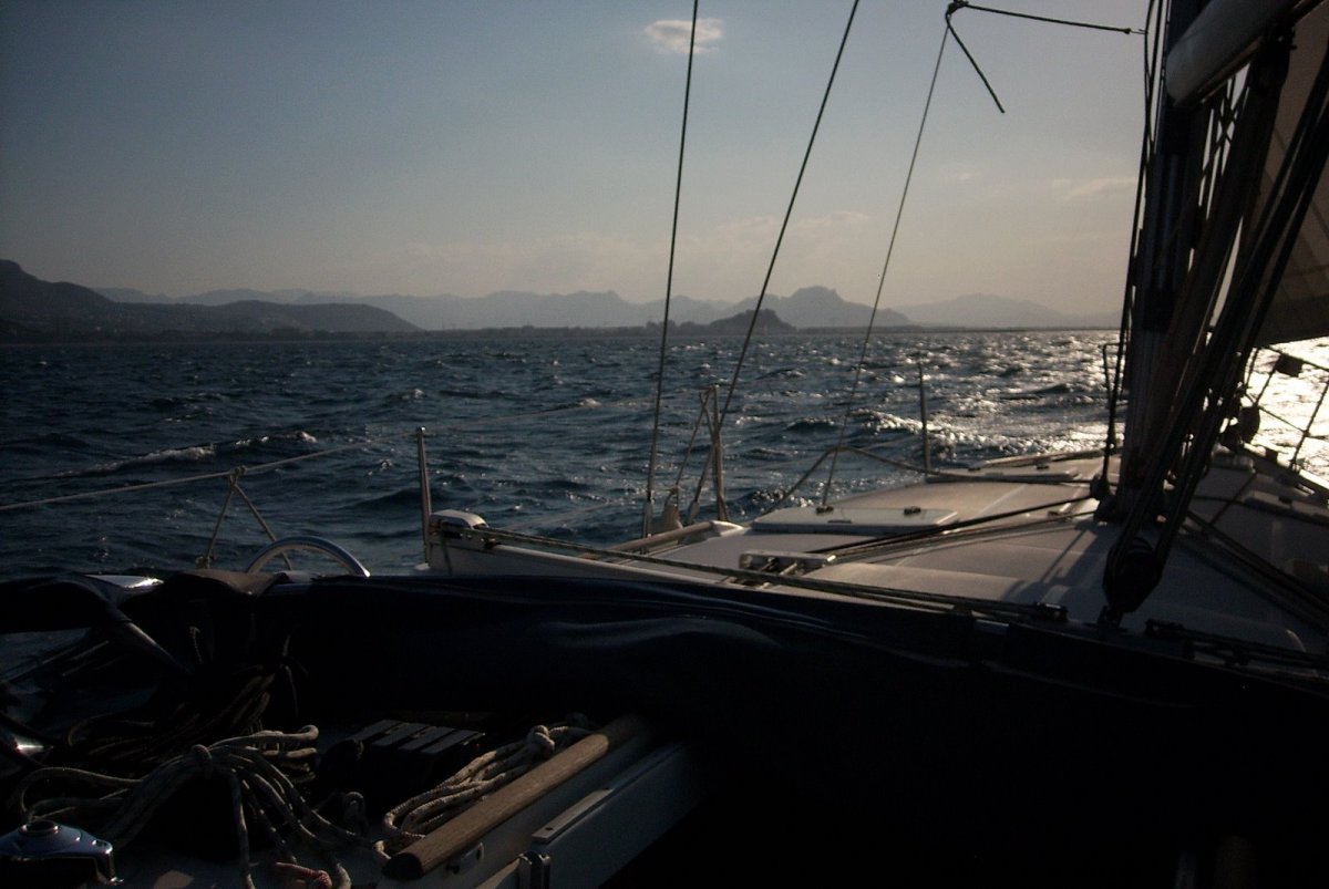 Yacht skipper boat navigation practice in Denia