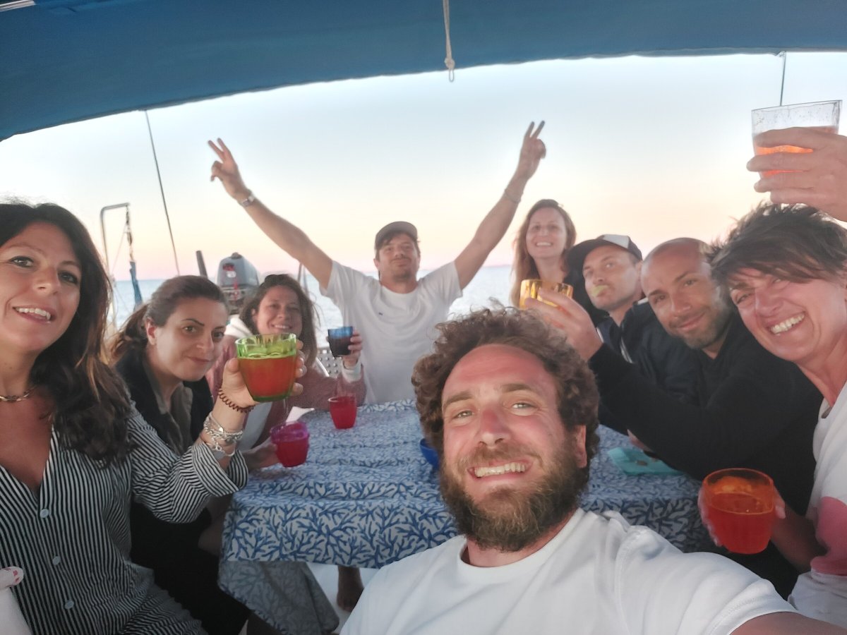 Sailing a sailboat in the Egadi