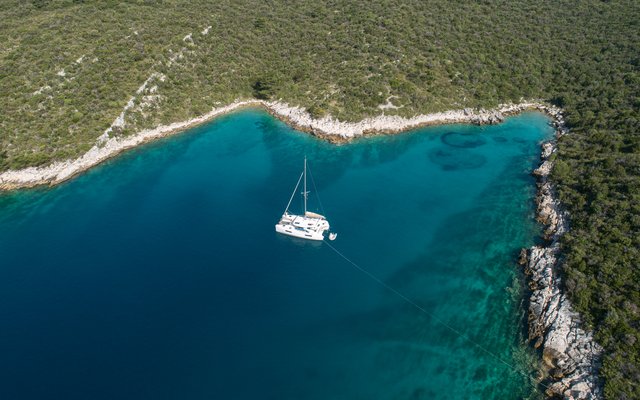 Relax in the sun and cool off in the crystal-clear waters of the Dalmatian Islands