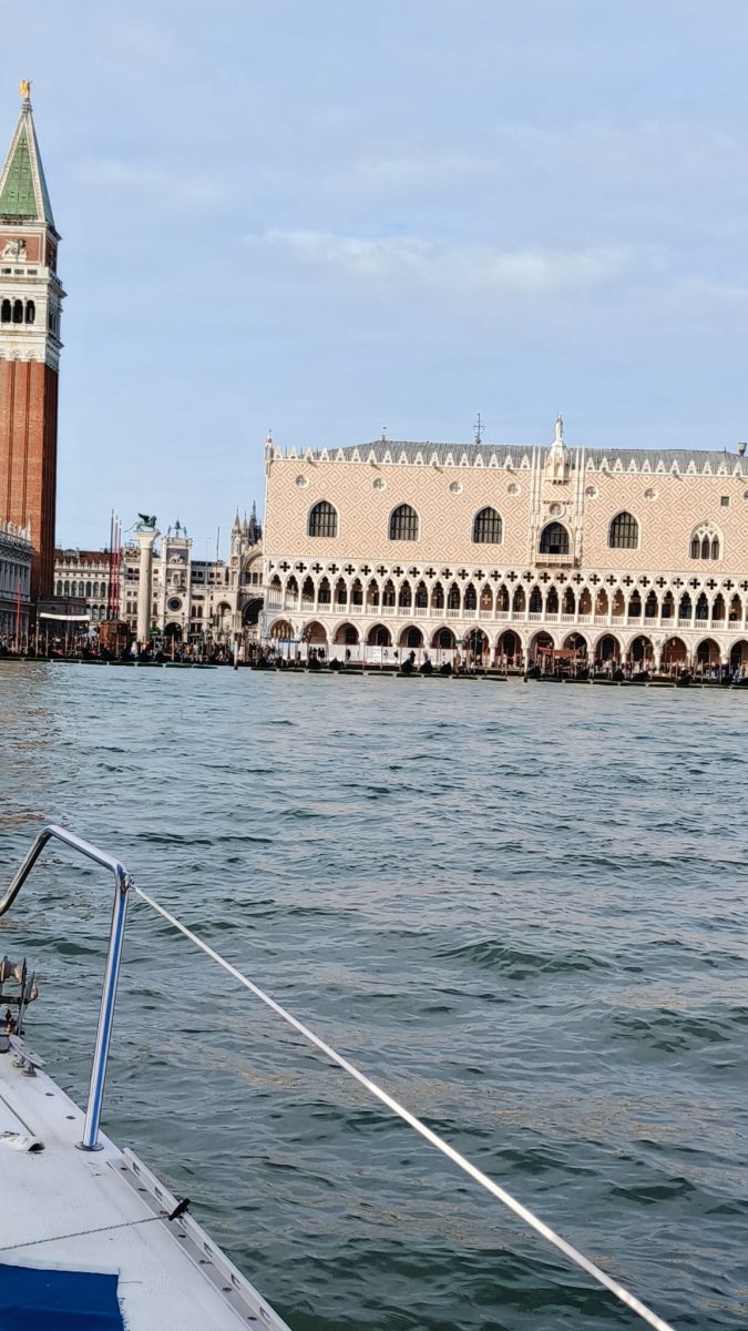 The canals of Venice with gondolas and ancient buildings
