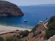 Exploring the Cyclades on a boat trip, with a stop at Poseidon's temple