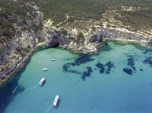 From the port of La Savina, we set sail towards Es Caló, a picturesque cove with crystal-clear waters and breathtaking scenery.