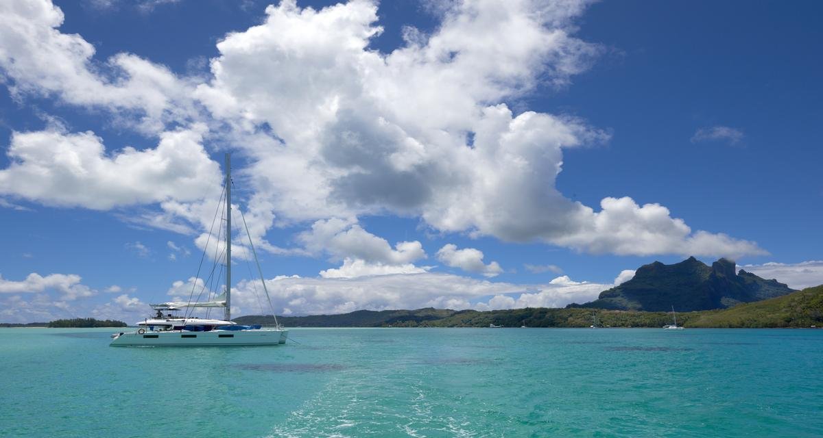 The blue sky and crystal clear water of Bora Bora
