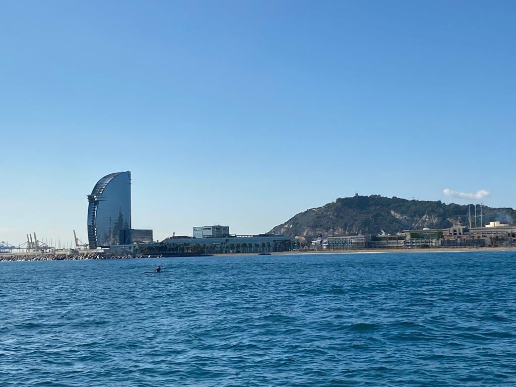 Aerial view of a sailboat on the sea near Barcelona