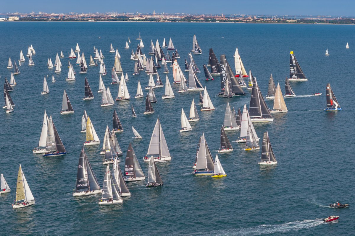 Sailboat journey through Venetian canals