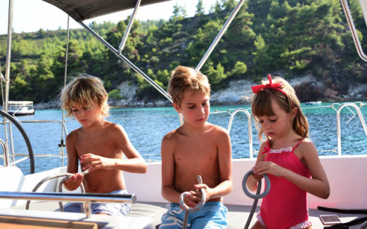 Children learning to tie knots