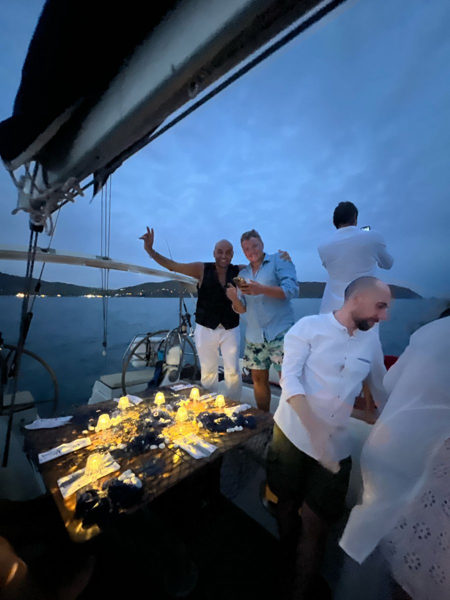 Group of people learning to sail on the sea