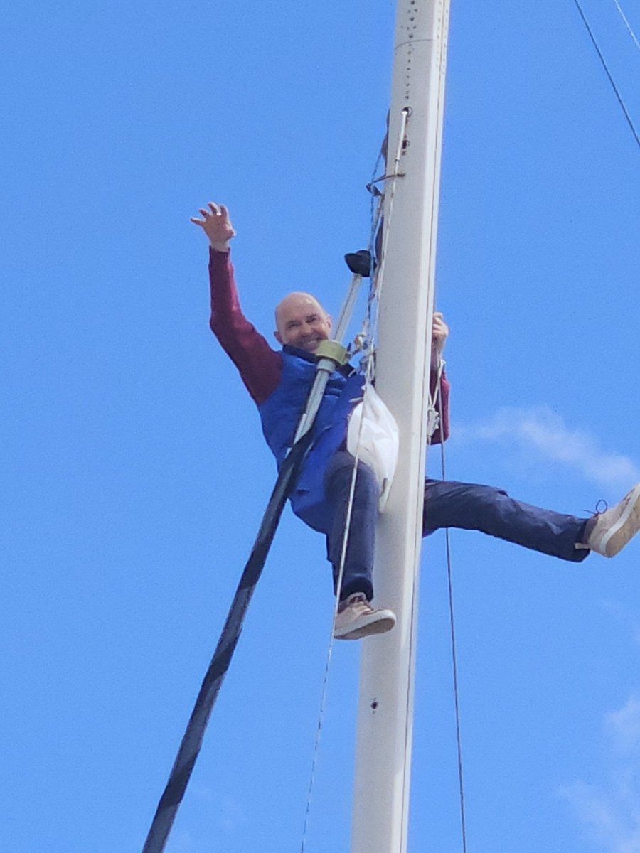 Teacher giving navigation class on a boat