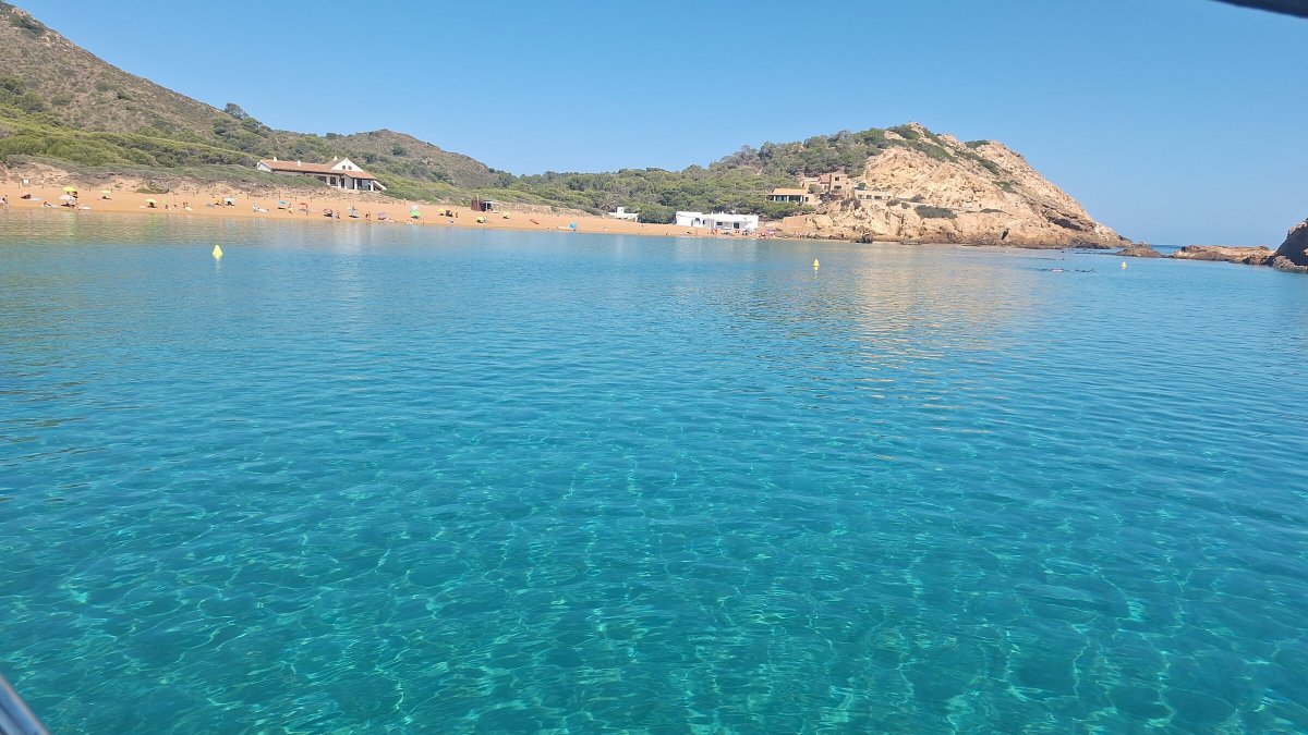 Sailing through the crystal-clear waters of Menorca