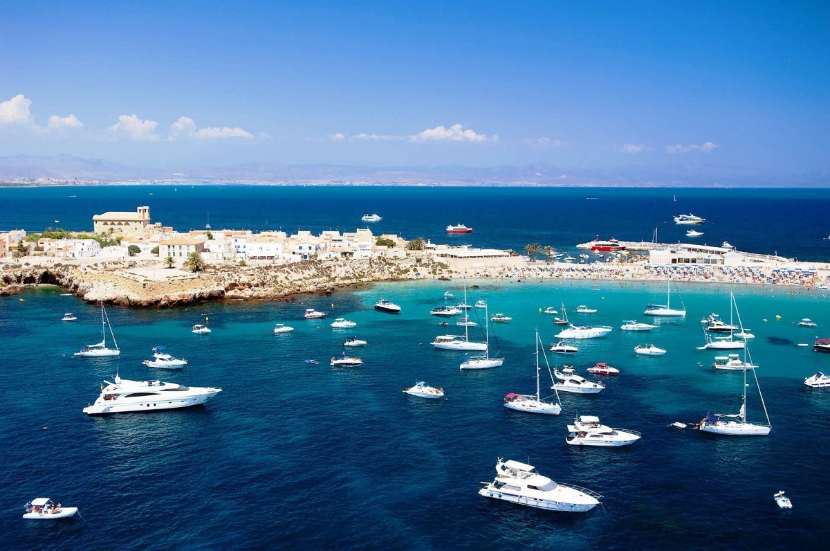 Sailing a catamaran in Santa Pola Bay and Tabarca Island