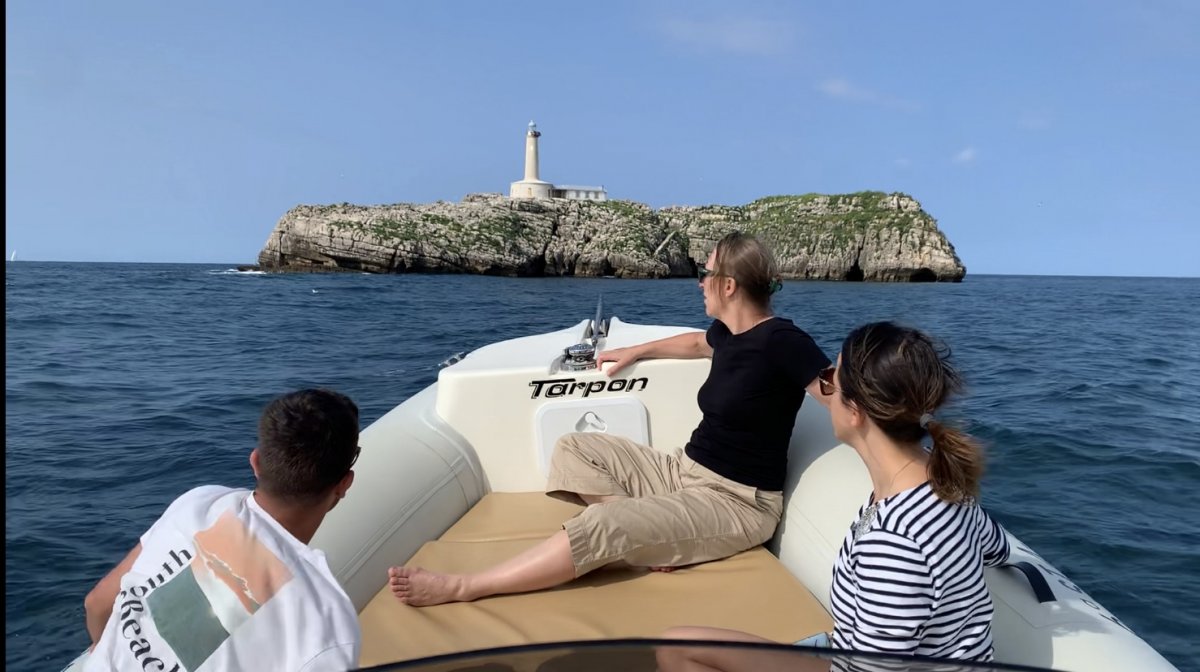 The boat passes by Playa de la Magdalena