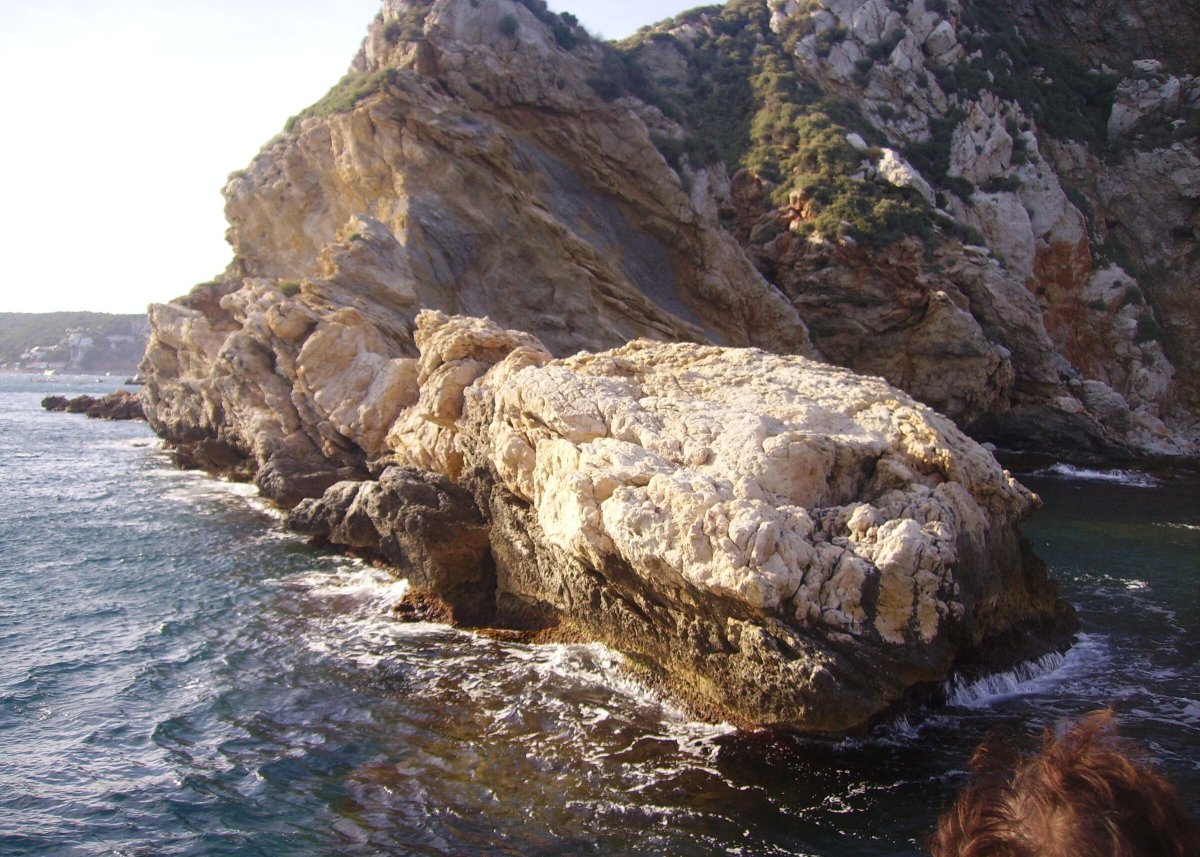 Yacht sailing at Columbretes coast with natural scenery