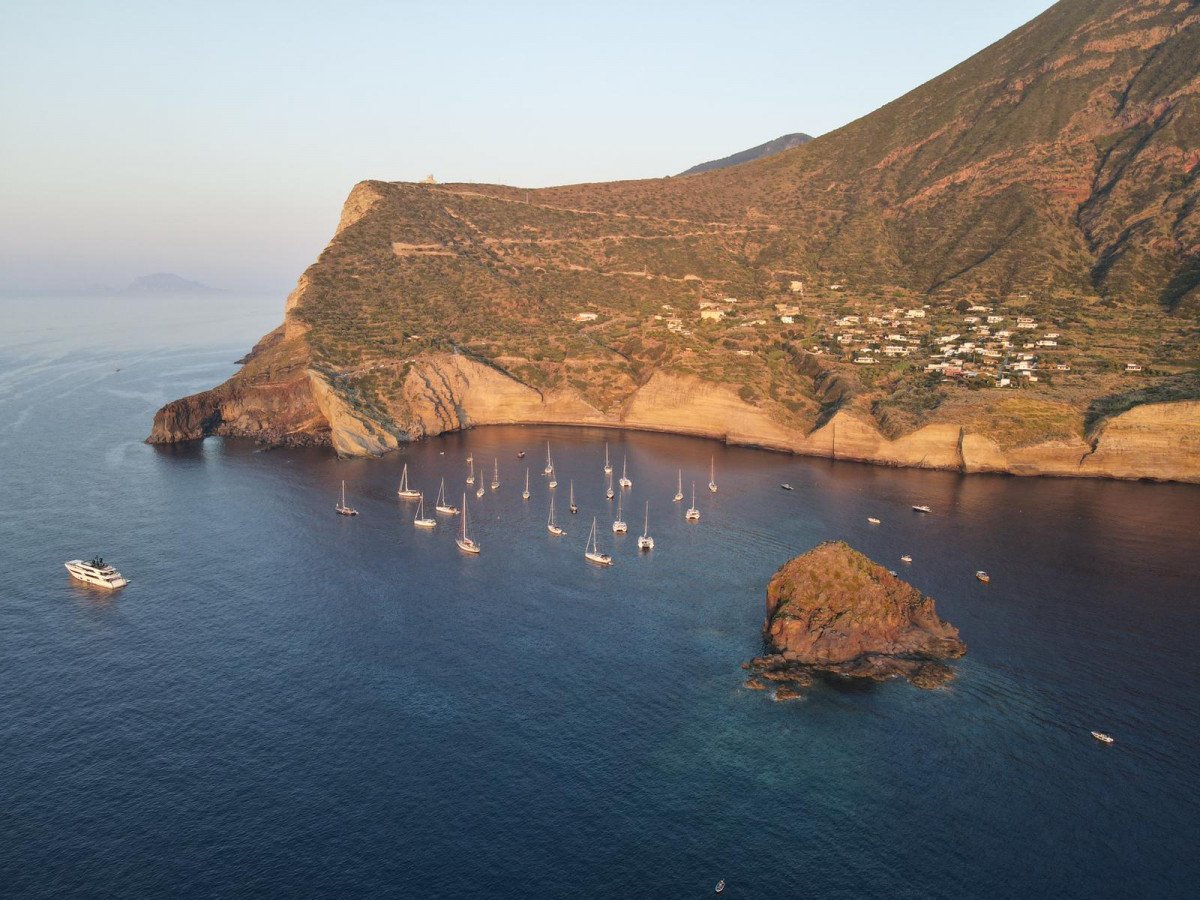 Explore the crystal-clear waters of the Aeolian Islands by catamaran