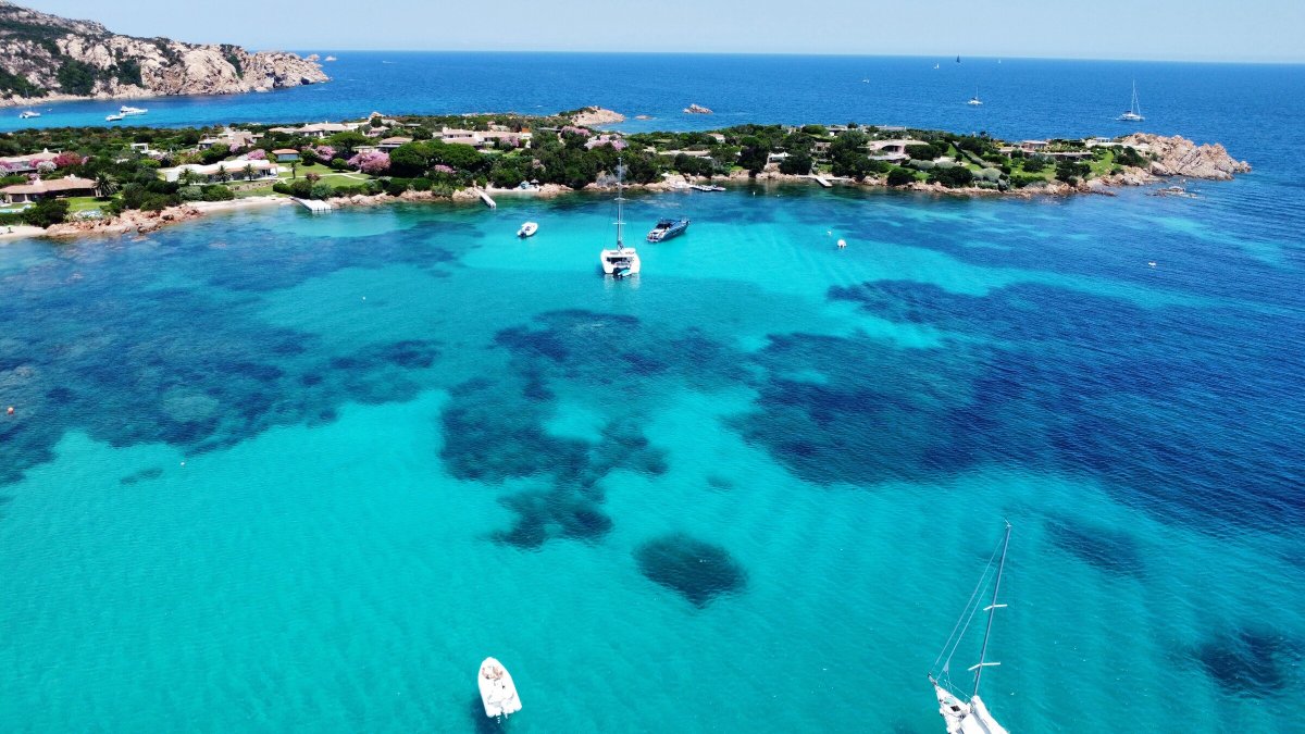 Relax in the Clear Waters of Santa Maria Bay