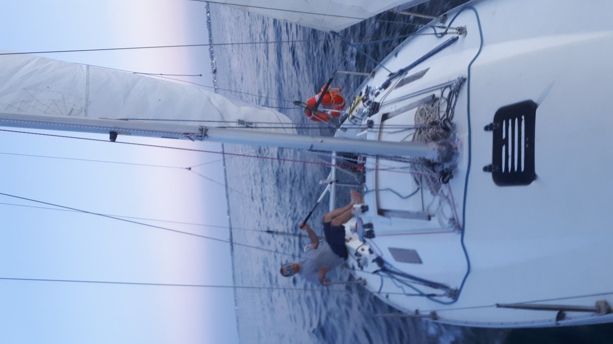 Enjoy the sunset over the Mediterranean Sea from a boat in Sardinia.