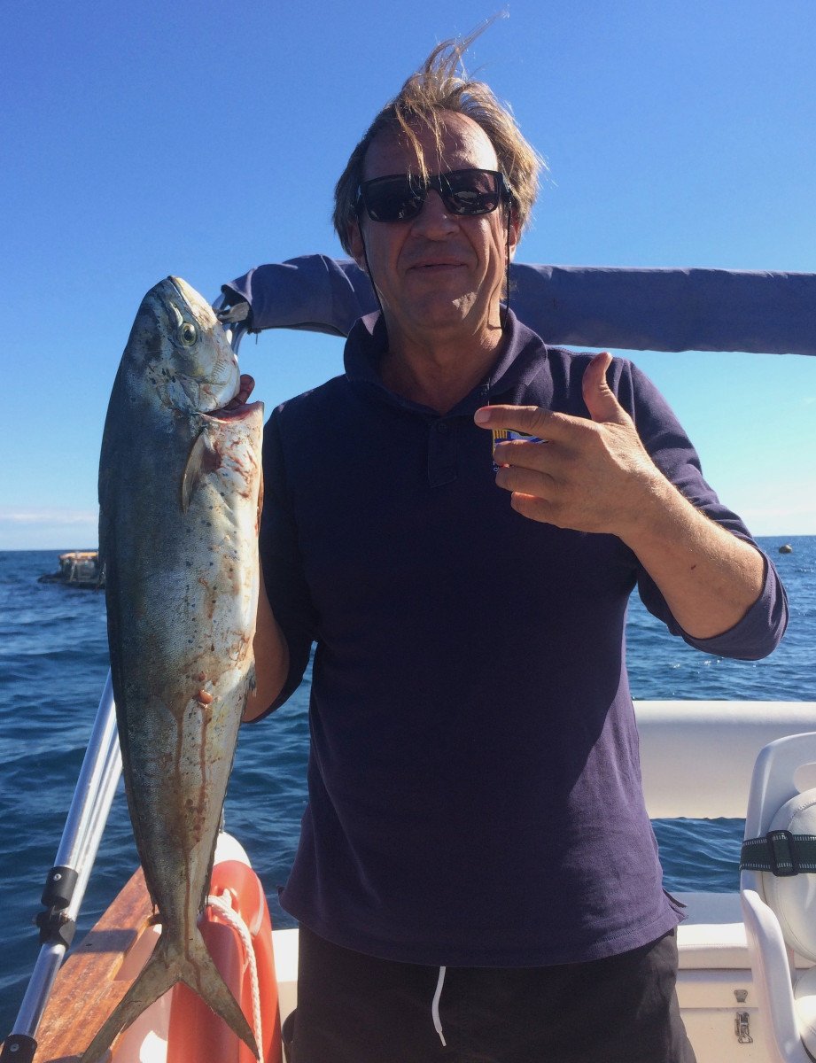 Explore the waters of Serra Gelada on a fishing and boat excursion trip