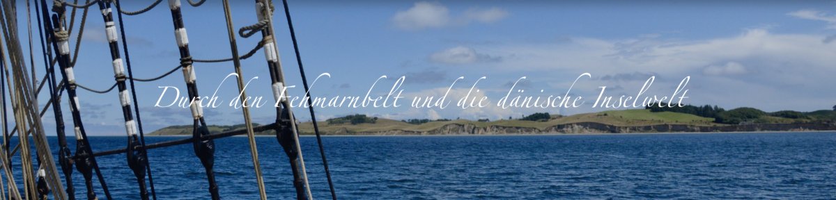 Boat sailing through Fehmarnsund to Danish islands.