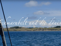 Boat sailing through Fehmarnsund to Danish islands.