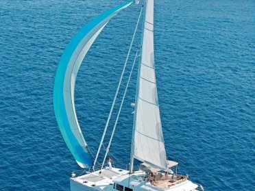 Sail around Ibiza and Formentera and visit their most hidden coves by catamaran