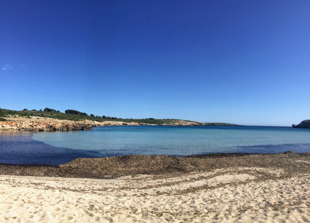 Venture into Menorca's natural trails and white sand beaches