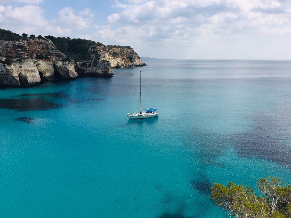 Venture into Menorca's natural trails and white sand beaches