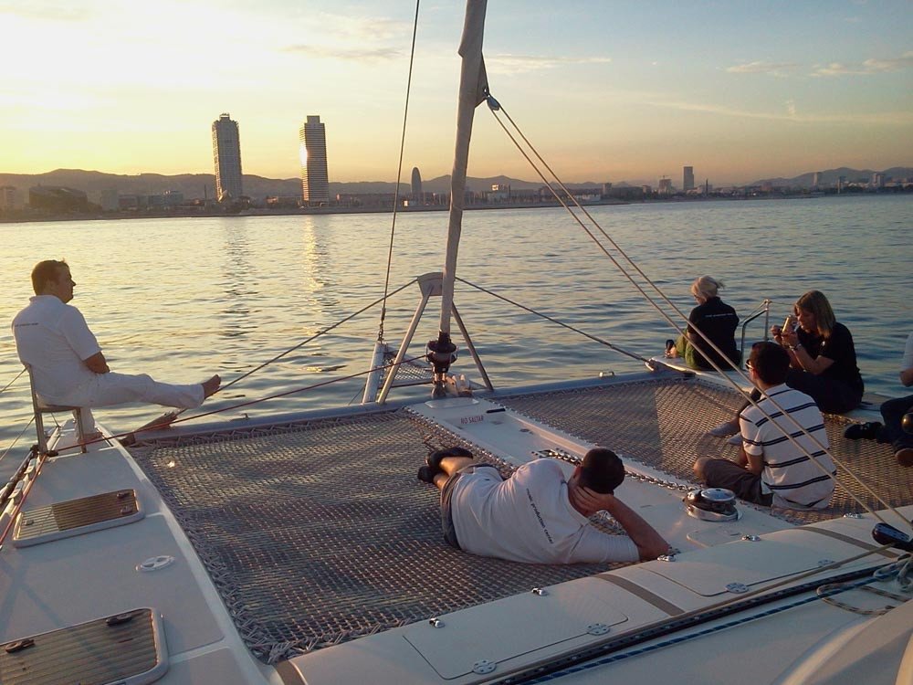 sunset compartido catamaran barcelona