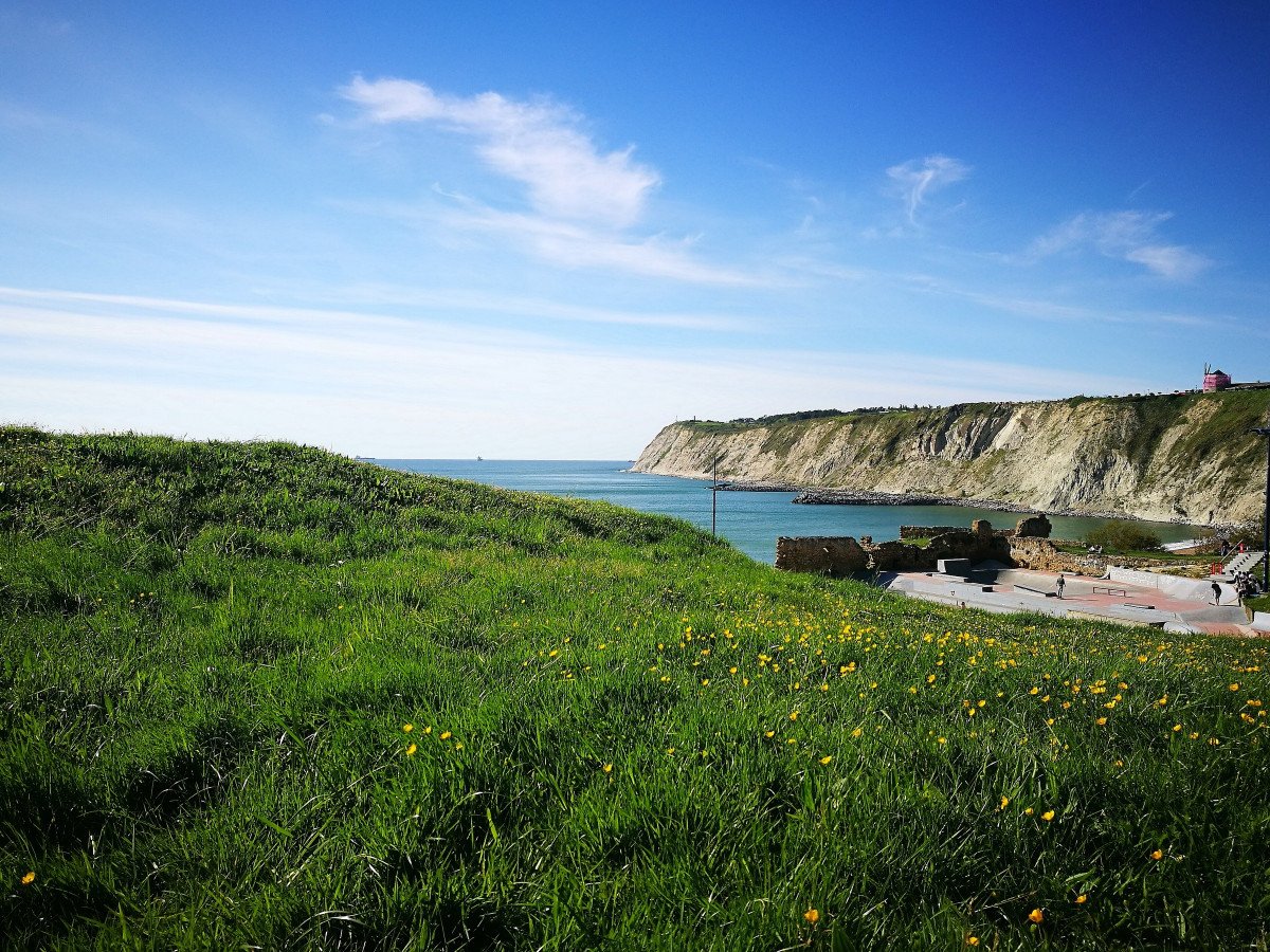 Enjoy the views of the Basque coast while learning to sail.