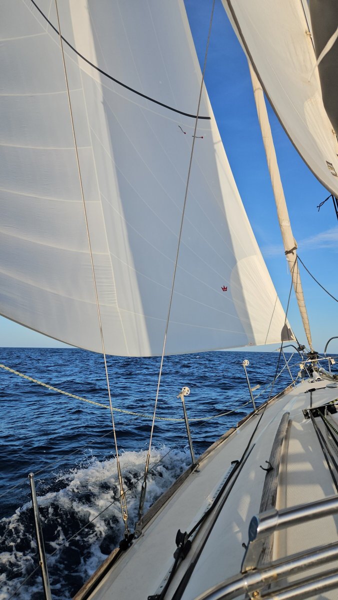 Teacher teaching asymmetric sail techniques