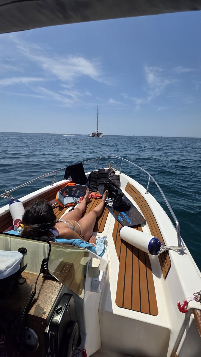 Boat passing by the coast of Barcelona