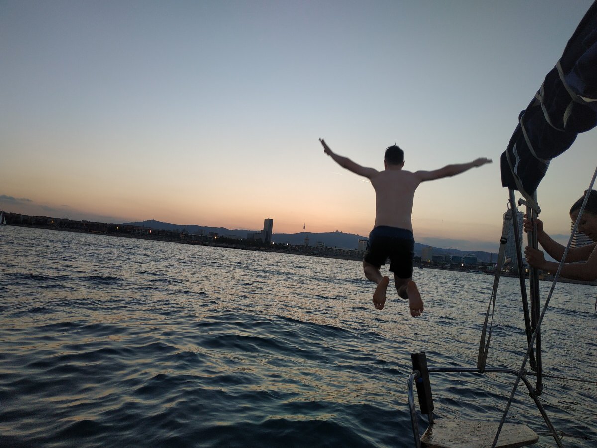 Sail through the azure waters of Barcelona